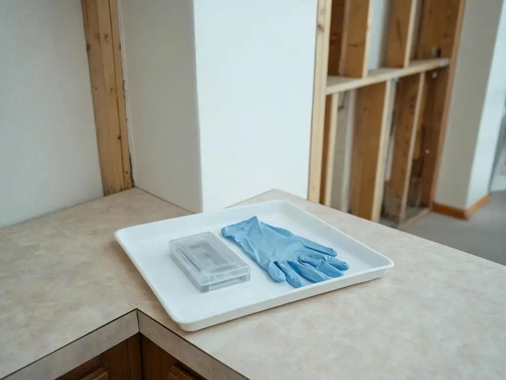 Sealed sample cassette and gloves on a clean tray
