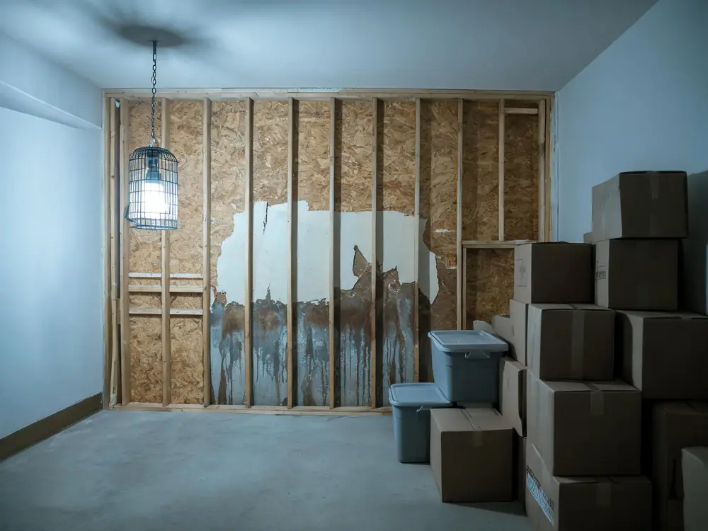 Storeroom stock pulled away from a damp exterior wall
