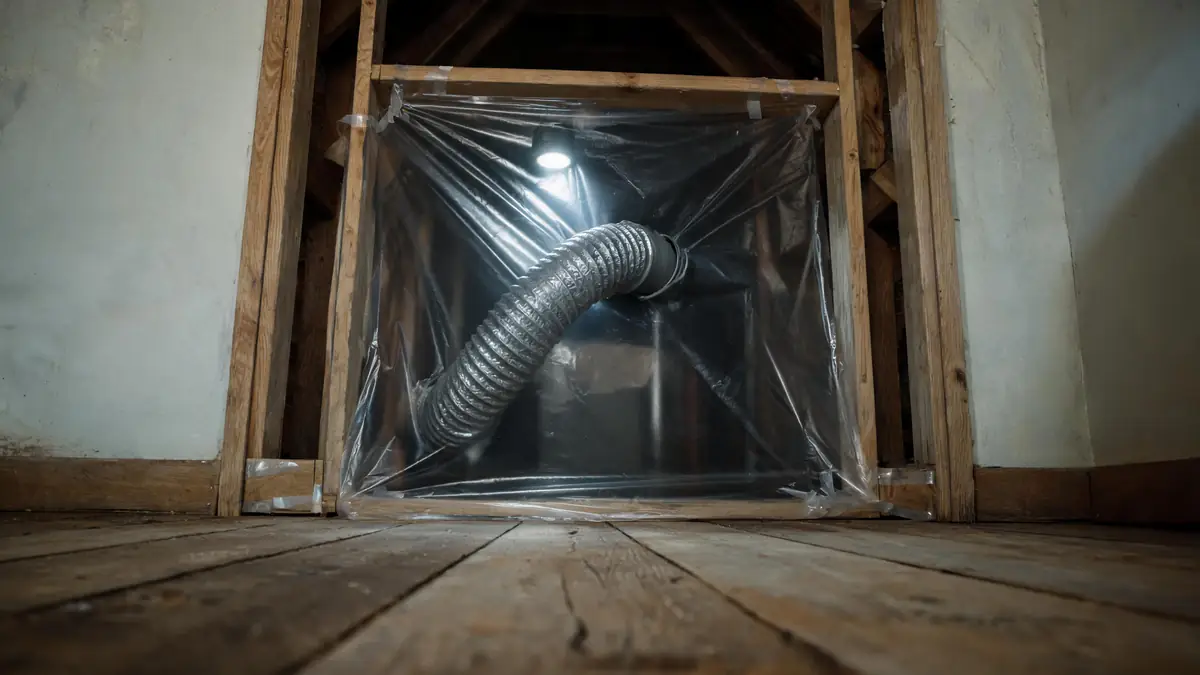 Negative air machine ducted through containment sheeting